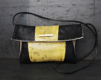 Avant-Garde Luxury: The Bold Fusion of Snake and Fish Leather Evening Bag. Handcrafted patchwork design.