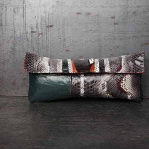 Serpent Geometry: The Precision of Modern Exoticism. Handcrafted Python Leather evening Clutch.