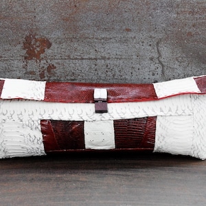 Exotic Elegance: The Fusion of White Python and Deep Burgundy hand stitched handbag. The stylish evening purse.