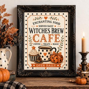 May include: A framed wall art print featuring the text "ENCHANTING FOOD SERVED DAILY WITCHES BREW CAFE COFFEE TREATS MAGIC OPEN DAILY" with illustrations of a polka dot mug, a cupcake, a witch hat, and a pumpkin in orange, black, and cream.