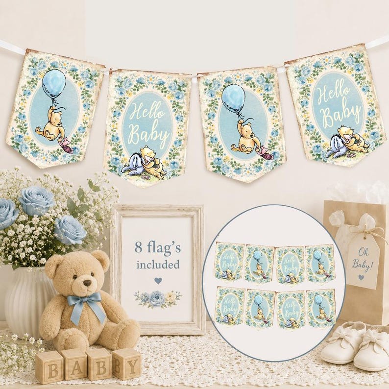 May include: A decorative bunting banner featuring eight pennants with illustrations of Winnie the Pooh holding a blue balloon, surrounded by blue floral wreaths and the text Hello Baby. The set includes a sign stating 8 flag's included.