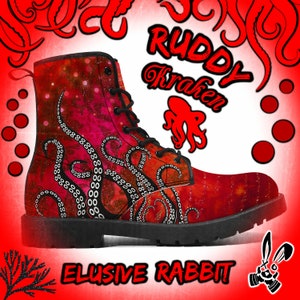 May include: Red and black combat boots with a galaxy print and an octopus design. The boots have black laces and a black sole. The text "RUDDY Kraken" is written in black on a red background.