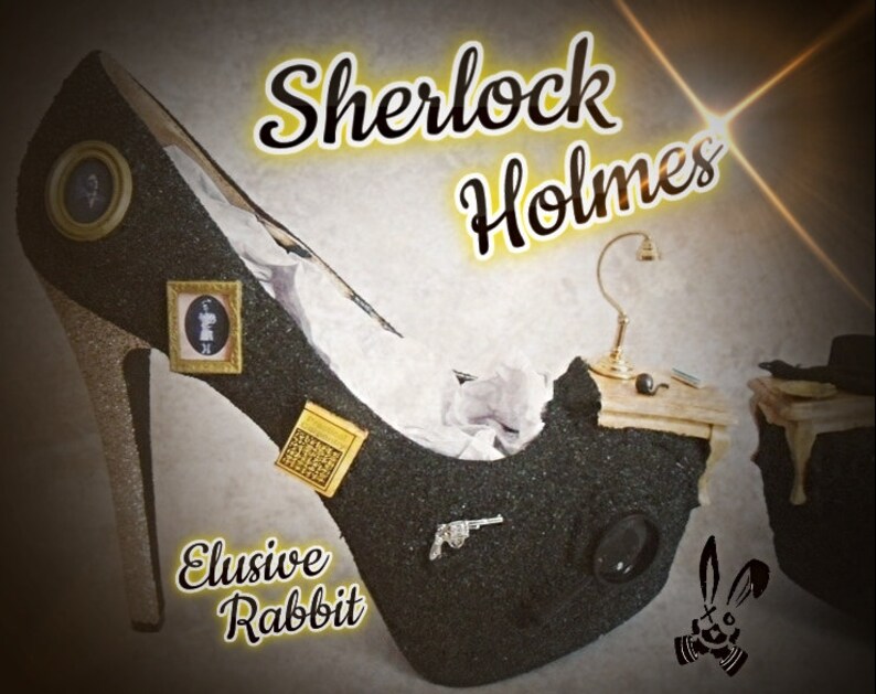 May include: A black high-heeled shoe with glitter, decorated with miniature furniture, a magnifying glass, a gun, and framed pictures. The shoe is labeled "Elusive Rabbit" and "Sherlock Holmes".