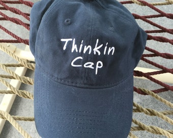 Thinkin Cap - Navy with White Letters - Reverses on the back to say "Not Thinkin"