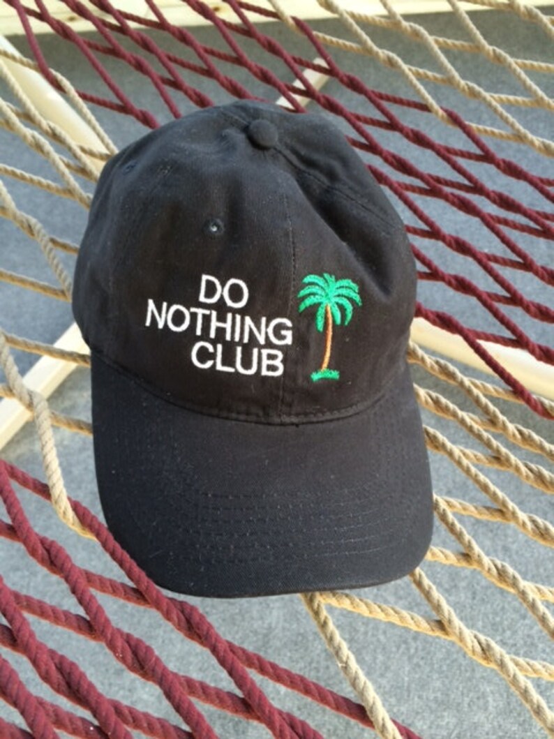 Black Hat With White Lettering- Member on the Back Panel Do Nothing Club