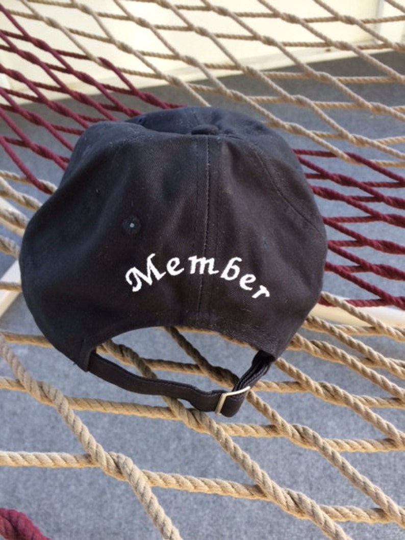 Black Hat With White Lettering- Member on the Back Panel Do Nothing Club