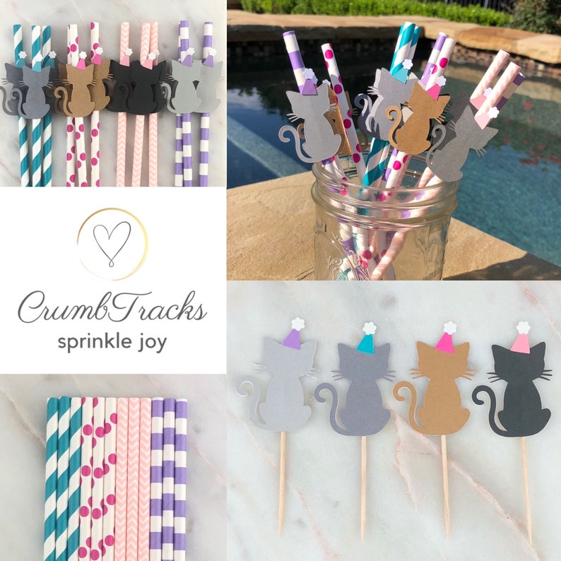 May include: A collection of party supplies featuring cat-shaped decorations. The image includes paper straws with cat cutouts, cupcake toppers, and a jar filled with straws. The straws have various patterns and colors, including blue, pink, and purple.