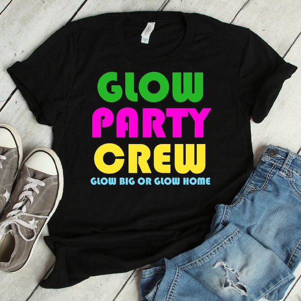 Glow Party Crew T-Shirt | Glow Big Or Glow Home Shirt | Bright Glowing Effect Shirt | Short-Sleeve Party Celebration Unisex Tee