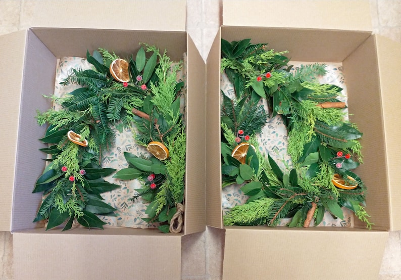 Fresh Christmas garland, mantlepiece. scented dried oranges, Bay leaves, evergreen fir, red berries, cinnamon sticks. Smells divine image 3