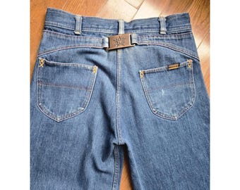 Jeans vintage anni '70 a zampa d'elefante / Taglia 29x27 con fibbia sul retro / Made in Cali - LEGGERE