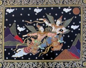 Vintage Framed Beaded Kalaga Burmese Tapestry 37 quot x 29 1 2 quot - two winged quot Angels quot flying over mountains, under glass in black frame.