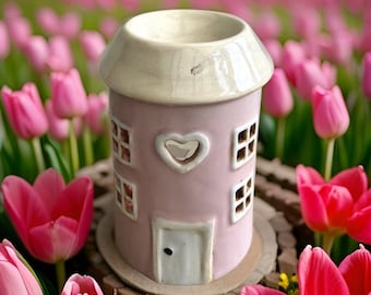 Pink round pottery house oil/wax burner
