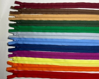 Set of 12 - 22 inch ,#3 nylon coil, YKK® zippers. Assortment of Brights & Darks