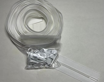 Zippers by the Yard - four yards of 16mm zipper tape with 16 extra-large zipper pulls.  Color - White