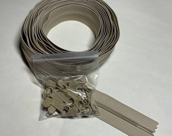 Zippers by the Yard - four yards of 16mm zipper tape with 16 extra-large zipper pulls.  Color - Natural