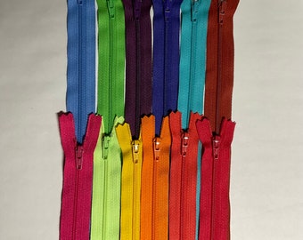 Set of 12 - 22 inch ,#3 nylon coil, YKK® zippers. Assortment of Brights & Darks