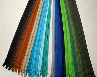 Set of 24 - 14 inch ,#3 nylon coil, YKK® zippers. Blues, Greens, & Browns