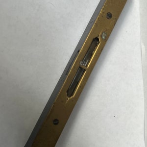 Vintage brass and wood level tool