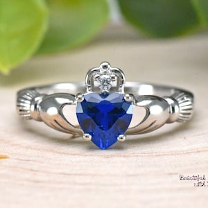 Womens Girls Claddagh Ring Irish Claddagh Ring Sterling Silver Wedding Band Promise Ring for Her Blue Sapphire CZ September Birthstone Ring