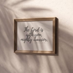 This Judges 6 12 printable says the Lord is with you Mighty Warrior. It is a Boho style print for wall decor in a Christian Baby Nursery. This Scripture Wall Art can also be used for Decorating a Kids Room, or as a baby shower or birthday gift!