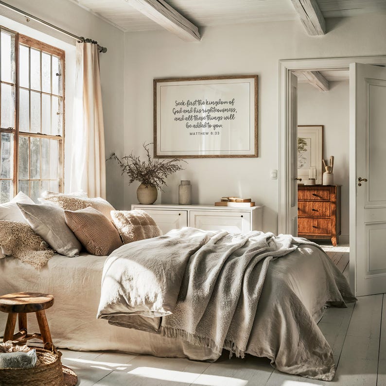 This mockup shows what this unframed Matthew 6 33 Bible verse poster could look like in a modern bedroom. It has a white background and gray text. It says seek first the kingdom of God and his righteousness and all these things will be added to you.