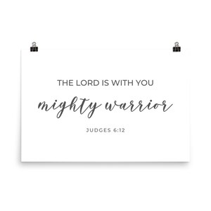 May include: White printable poster with the text "The Lord is with you mighty warrior" and the scripture reference "Judges 6:12".