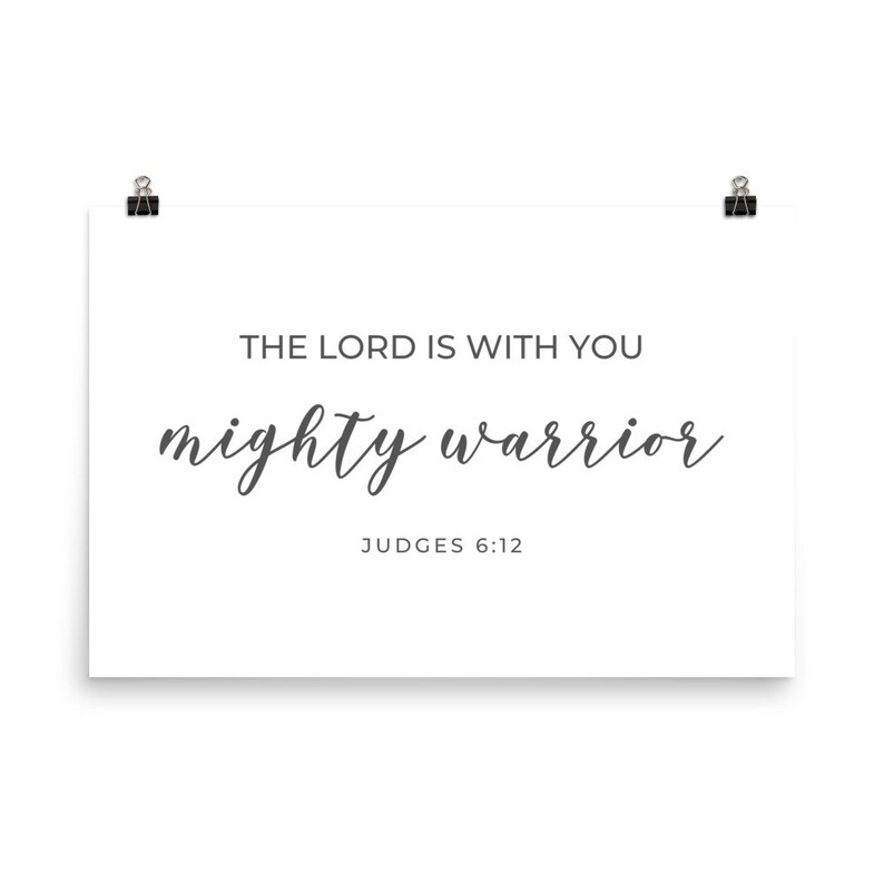 May include: White printable poster with the text "The Lord is with you mighty warrior" and the scripture reference "Judges 6:12".