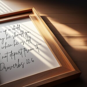 This is a mockup of what this Proverbs 22:6 unframed poster could look like framed. This Proverbs 22:6 unframed print says, Train up a child in the way he should go, and when he is old, he will not depart from it.