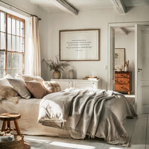 May include: A bedroom with a white bed, a white dresser, and a framed print on the wall. The print features a quote from the Bible, "Look at the birds of the air..."