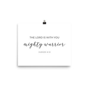 May include: A white printable poster with the text "The Lord is with you mighty warrior" and the scripture reference "Judges 6:12".