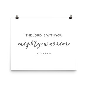 May include: White printable poster with black text that reads "The Lord is with you mighty warrior Judges 6:12"