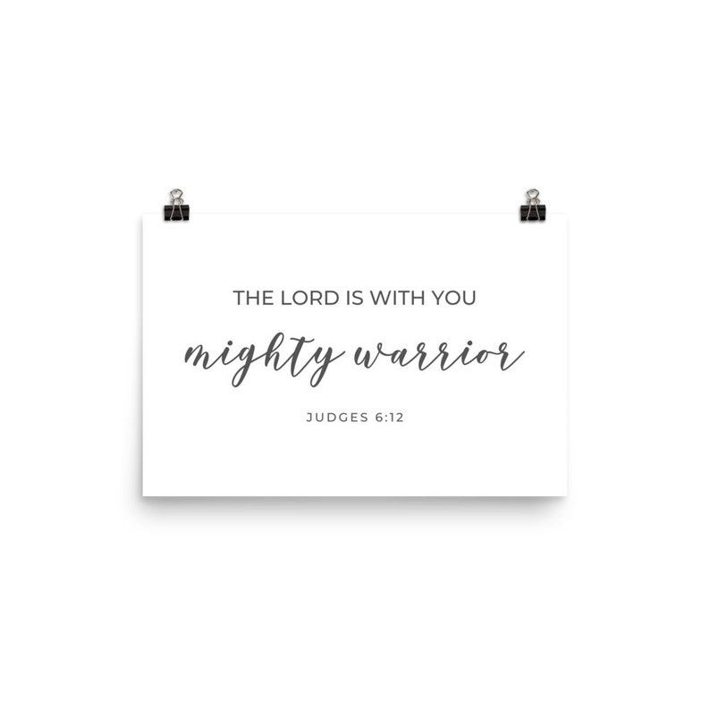 May include: White poster with black text that reads "The Lord is with you mighty warrior" and "Judges 6:12".