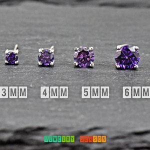 May include: Four silver stud earrings with purple gemstones. The earrings are shown in sizes 3mm, 4mm, 5mm, and 6mm.