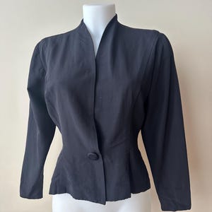 1940s 1950s vintage peplum silhouette black evening jacket