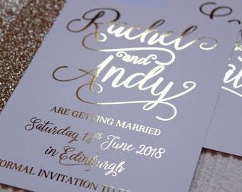 Luxury gold foil on silk white wedding save the date or evening cards with glitter lined white envelopes