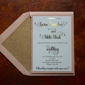 Luxury gold and blush pink day or evening invitations with glitter lined envelopes.