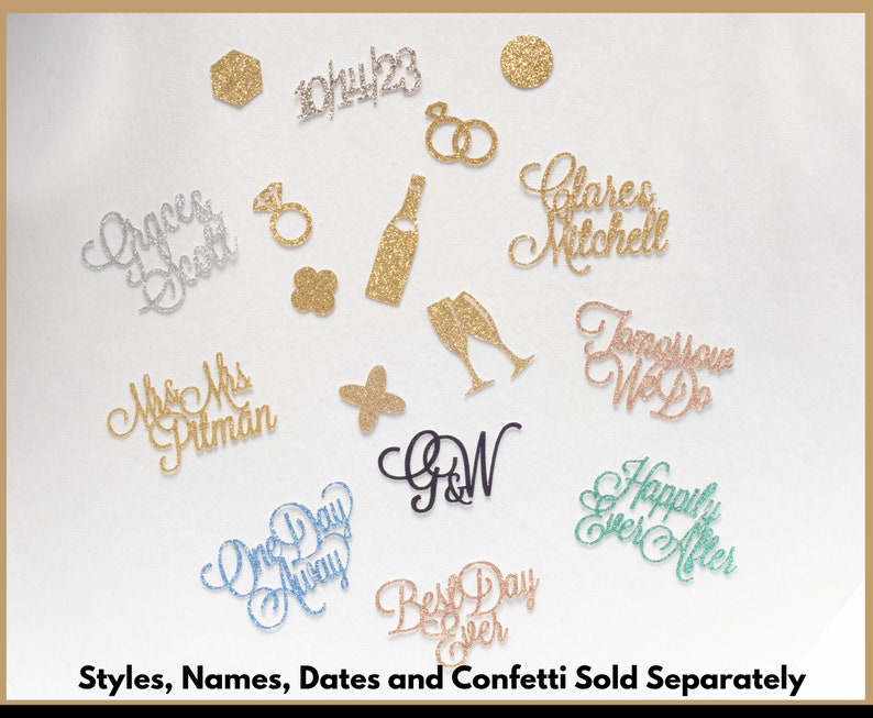 May include: Assortment of glitter confetti for a wedding celebration. The confetti features various designs including rings, champagne glasses, a bottle of champagne, a cross, the words "One Day Away", "Best Day Ever", "Happily Ever After", "Tomorrow We Do", "Mr & Mrs Pitman", "Clares Mitchell", "Grace & Scott", "G & W", and the date "10/14/23".