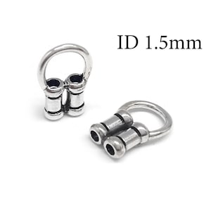 May include: Two silver-toned metal jewelry findings, each featuring a circular loop attached to a double-tube connector. The components have a polished finish with dark recessed detailing. The text ID 1.5mm is visible in the upper right corner.