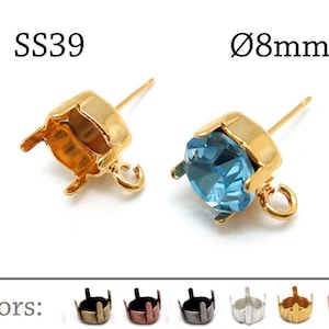 May include: Gold earring settings with a 8mm round bezel for setting stones. The settings have a post and loop for attaching to an earring finding. The settings are shown in gold, black, silver, and copper.