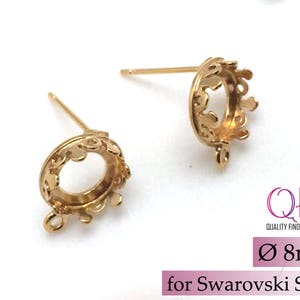 May include: Two gold-tone earring settings with a crown-shaped design. The settings are 8mm in diameter and are designed to hold Swarovski SS39 crystals.  The settings have a loop at the bottom for attaching to an earring finding.