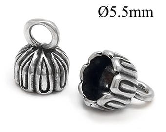 May include: Two silver-toned metal bead caps with a fluted, pumpkin-like design and a top loop for attachment. Each piece features a hollow interior and a diameter of 5.5mm as indicated by the text in the image. The finish is oxidized silver.