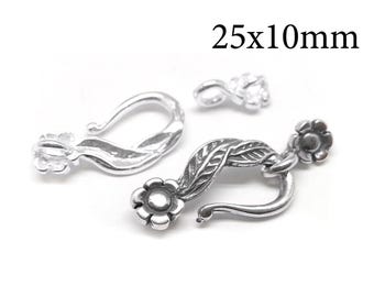 May include: Three silver-toned metal jewellery clasps featuring a floral and leaf design. The clasps have a hook mechanism and a flower-shaped end. The text 25x10mm is visible in the upper right corner, indicating the dimensions of the jewellery components.
