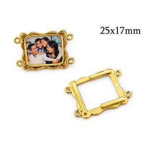 May include: Two gold-colored metal photo frame charms. One charm contains a family photo. The other charm is empty. The text "25x17mm" is displayed in black. These charms are ideal for jewelry making and crafting.