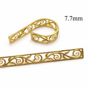 May include: Gold-colored filigree metal jewelry findings. One piece is a curved shape, and the other is a straight bar. The straight bar has a repeating pattern of swirls and leaves. The text in the image reads "7.7mm".