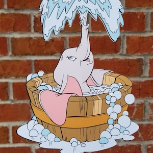May include: A cartoon illustration of a pink elephant taking a bath in a wooden tub with blue and white bubbles. The elephant has a blue shower head over its head.