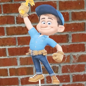 May include: A cartoon character wearing a blue shirt, brown pants, and a blue baseball cap holds a yellow hammer in his right hand. He is smiling and has a tool belt around his waist.