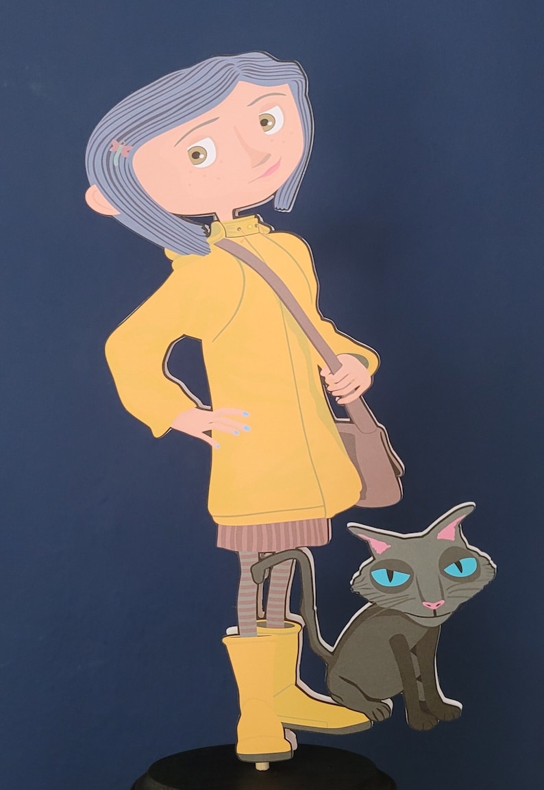May include: A yellow raincoat with a brown bag and a gray cat with blue eyes. The girl is wearing yellow rain boots and has blue hair.
