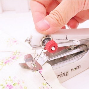 Small sewing machine home manual pocket sewing machine mini travel portable  multifunctional tailoring machine 