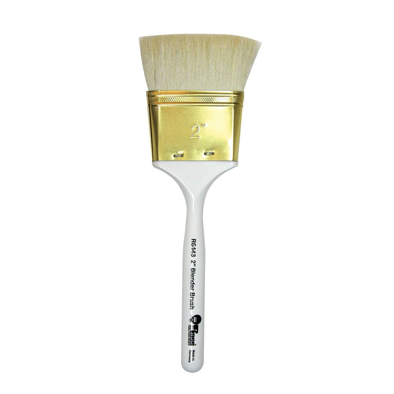 May include: A white 2-inch blender brush with a gold ferrule and a white wooden handle. The handle is labelled "R6443 2" Blender Brush".