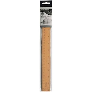 May include: A 12-inch wooden ruler with markings in inches and centimetres. The ruler is packaged in a clear plastic bag with a header card that says "Daler-Rowney Simply Wooden Ruler 12" 305mm".